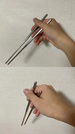 筷子握得高