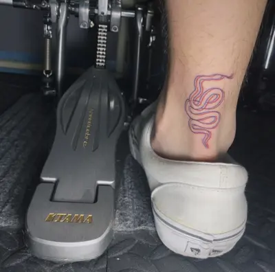 蛇刺青與 Tame Speed Cobra 910 雙踏